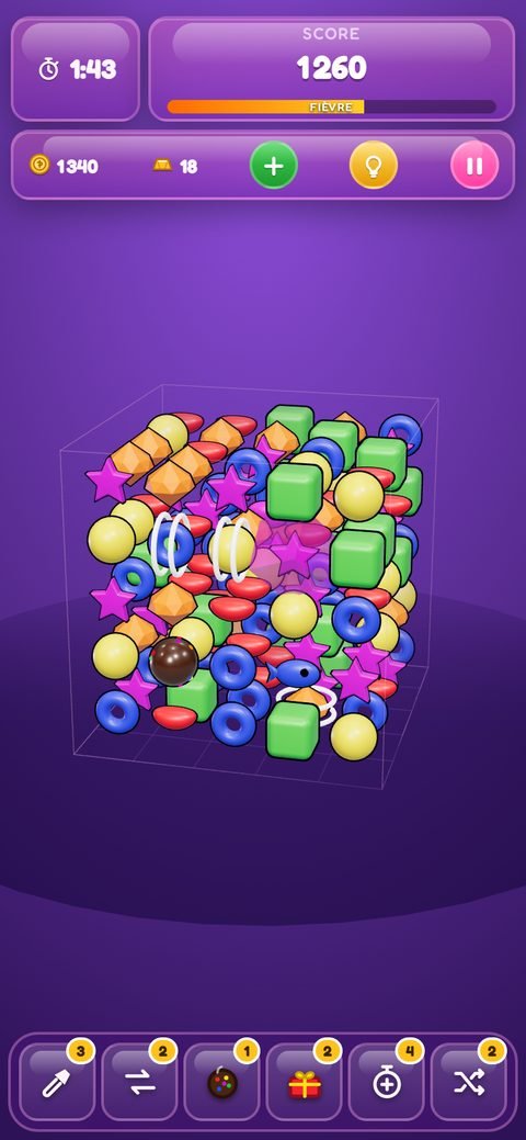 Partie en cours : le cube 5×5×5 de bonbons, le chronomètre et la barre de boosters